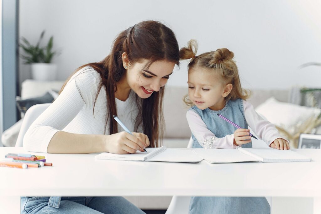 Mother helping child with academics