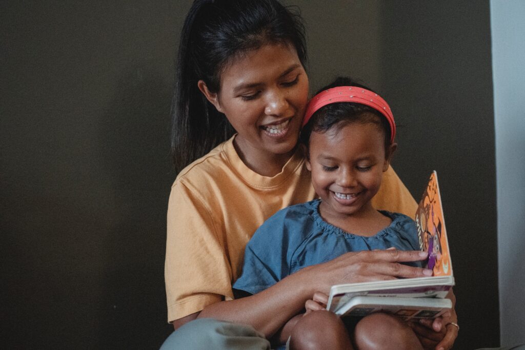 woman reading with child